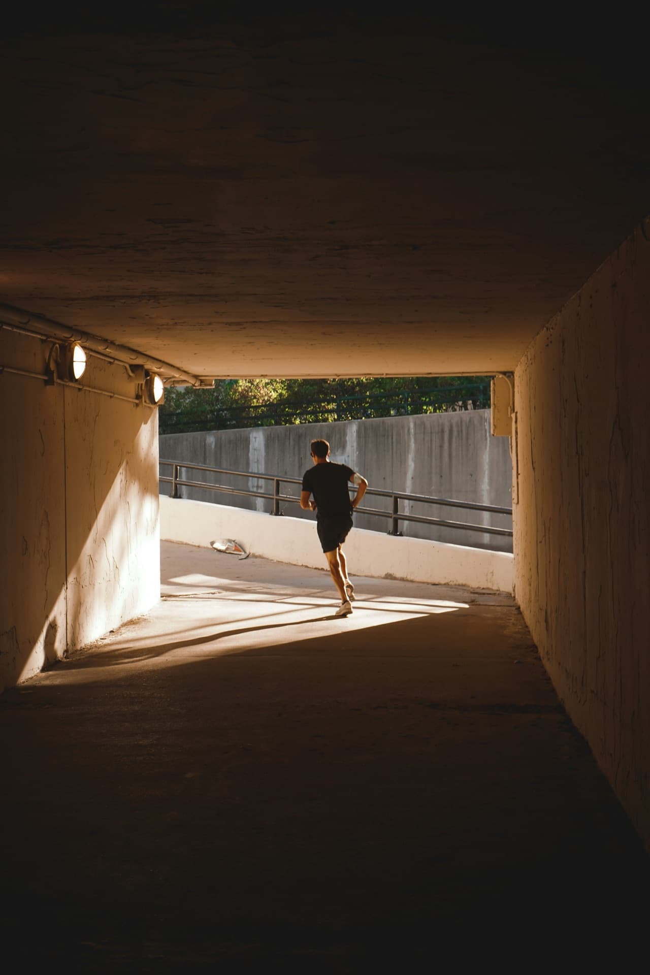 Runner in tunnel